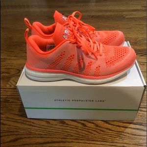 Orange/Coral APL running shoes